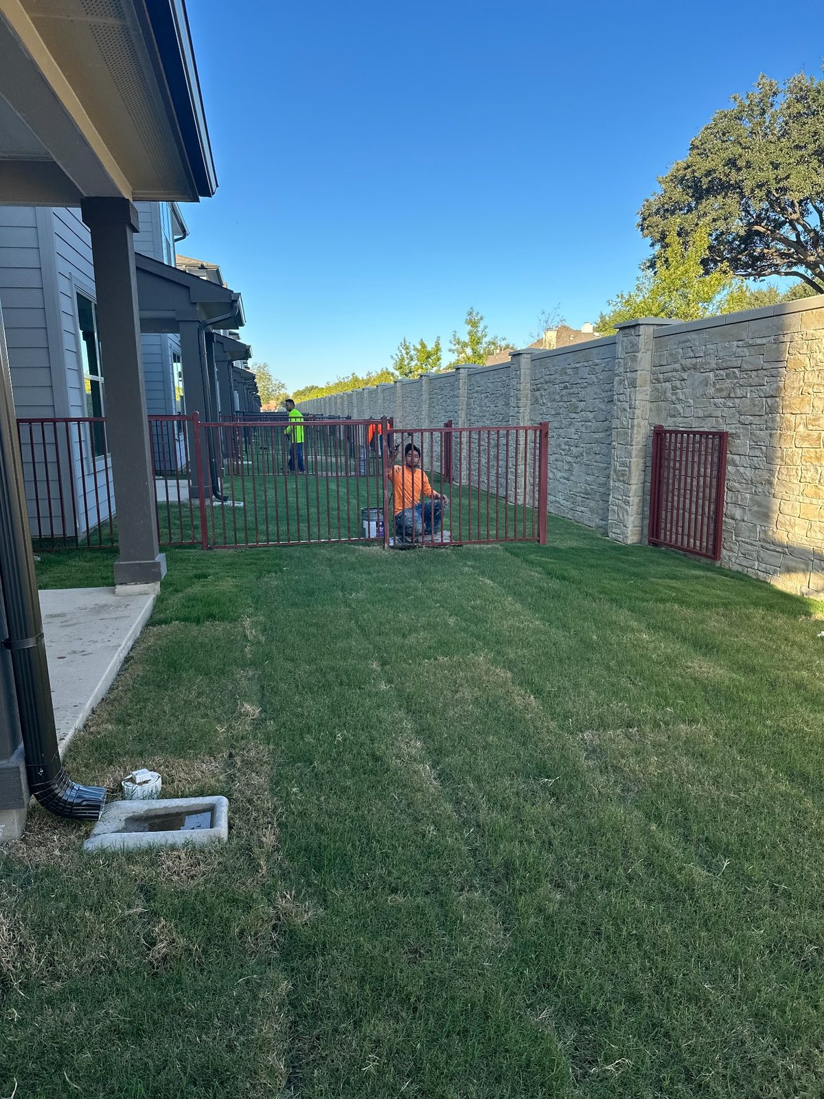 Exterior fence and railing painting for residential community