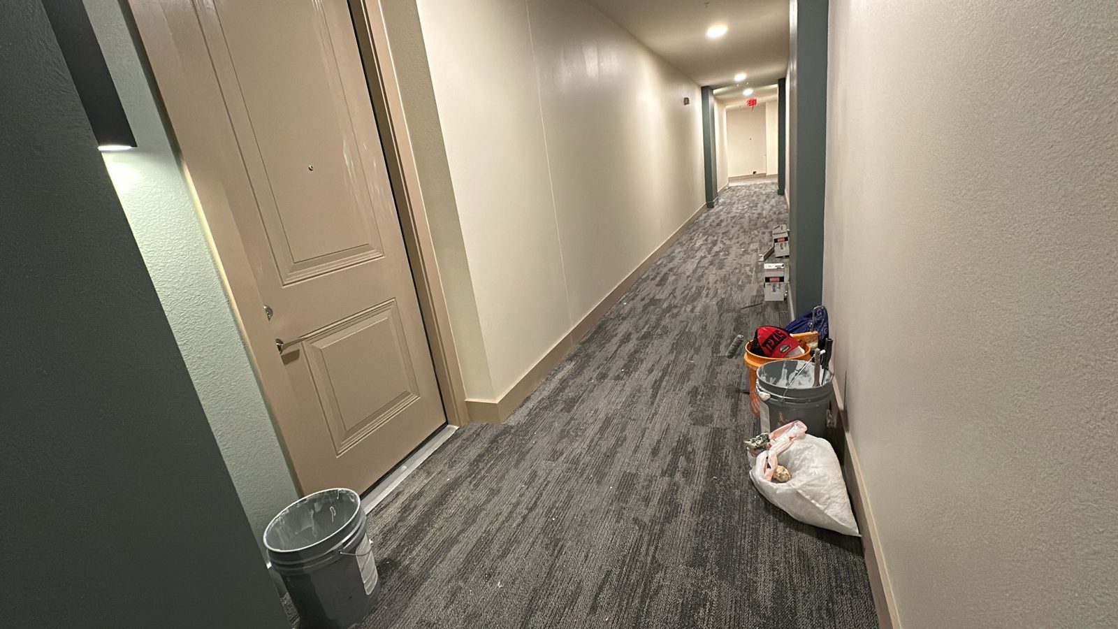 Finished multifamily hallway painting and trim work