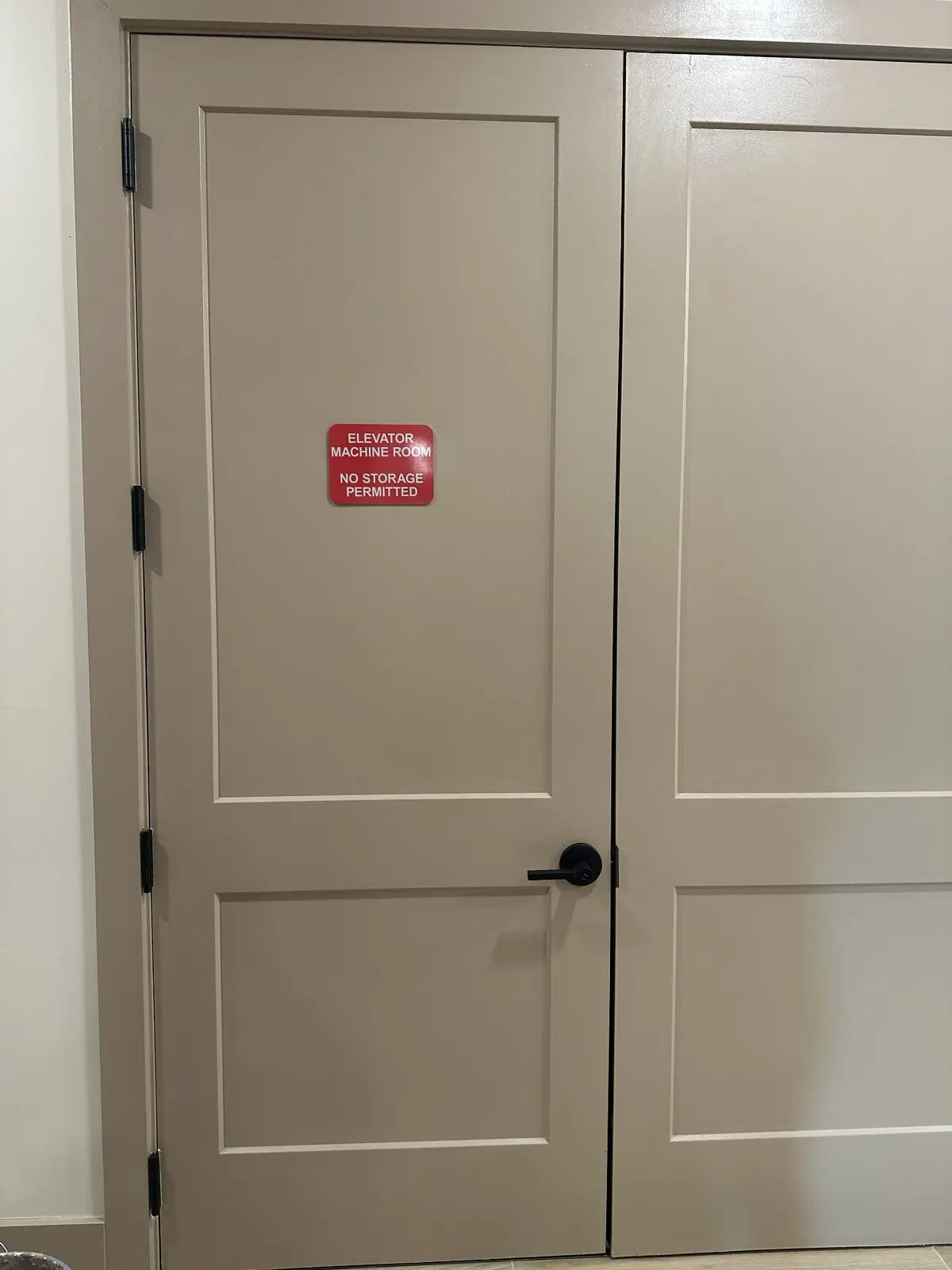 Finished commercial door repainting and restoration