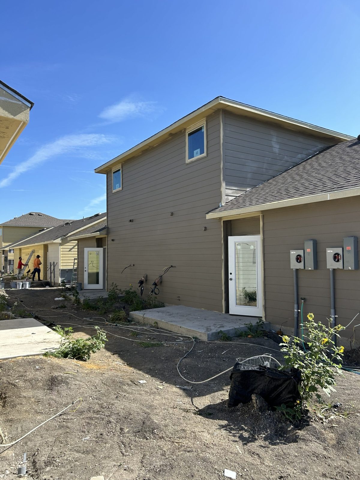 Residential exterior painting project in progress